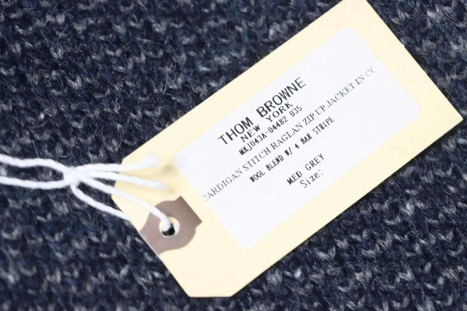 TB Structured Knit Sweater With Lapels - Image 7