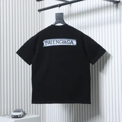 Balenciaga short-sleeved T-shirt in a distressed look with letter print made of adhesive tape on the back