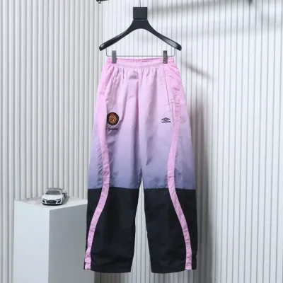 Trousers with color gradient and embroidered logo